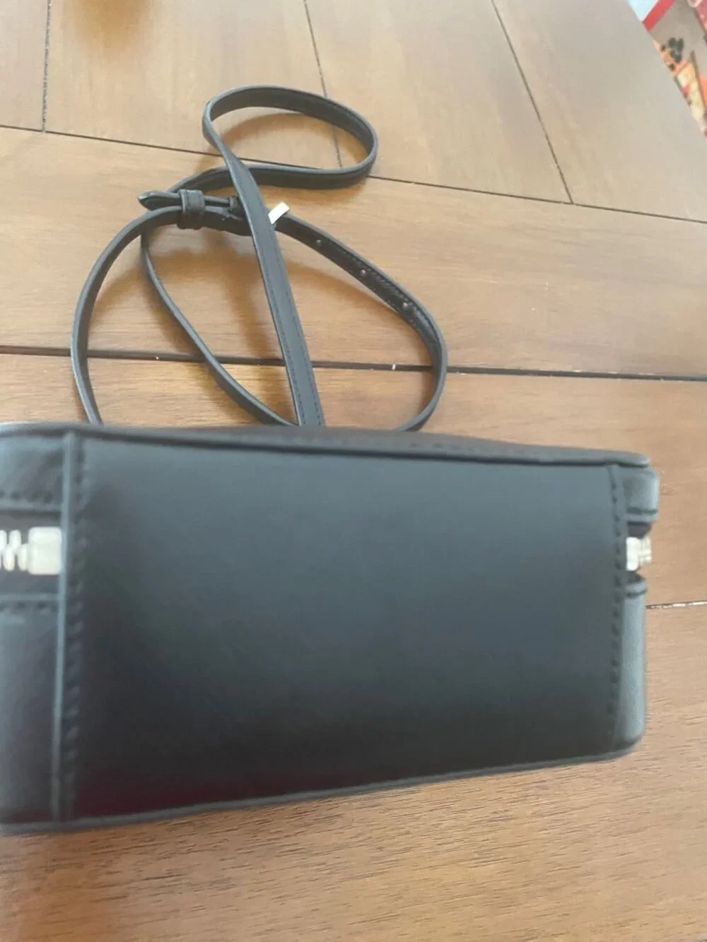 Kate Spade New York Daisy Vanity Crossbody Bag with front pocket and handle